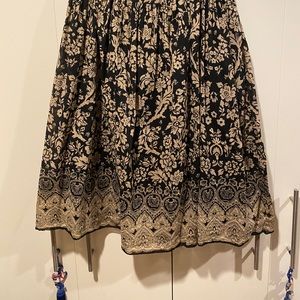 Black & Tan floral pattern cotton skirt with cotton lining.